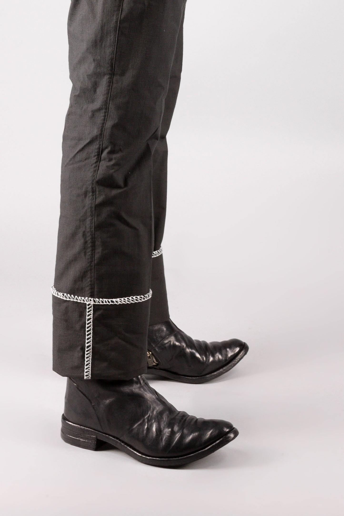 Unlined White Overlock Loop Zip Trousers