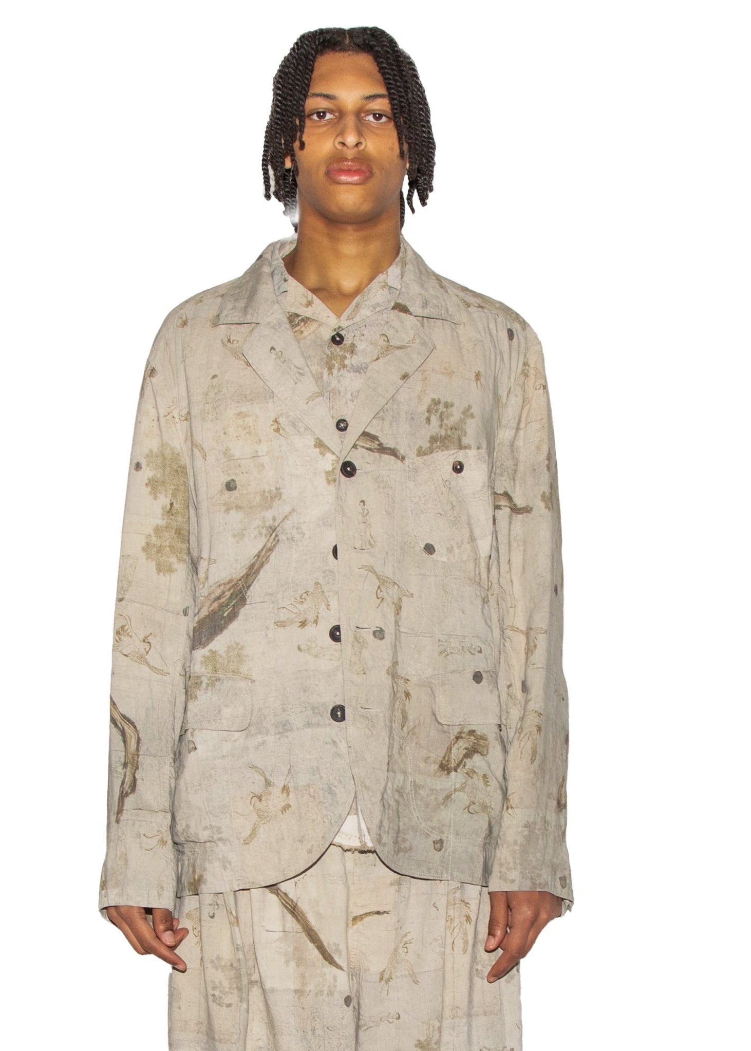 Beige suit with floral pattern on a white background